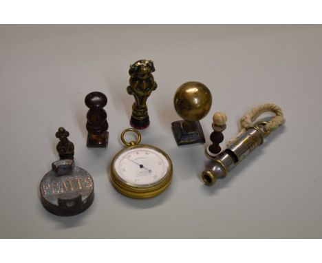 A mixed lot,&nbsp;to include: a gilt brass pocket aneroid barometer; a Metropolitan whistle; seals, etc. 