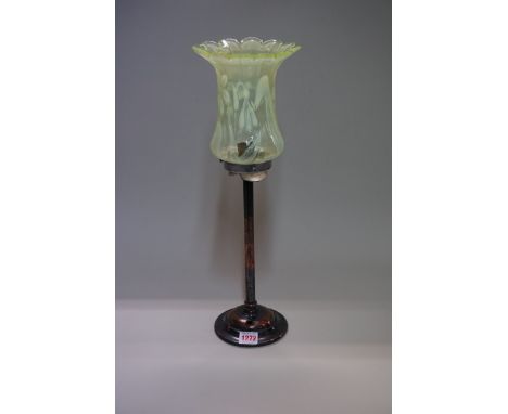 A copper table lamp,&nbsp;with moulded vaseline glass shade, total height 47cm, (chip to collar of shade).