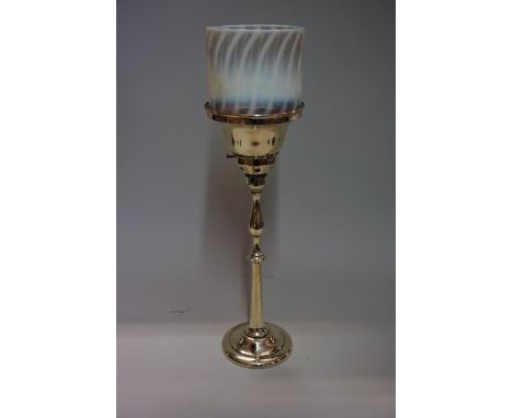 A brass oil lamp,&nbsp;with vaseline glass shade, total height 48.5cm.&nbsp; 