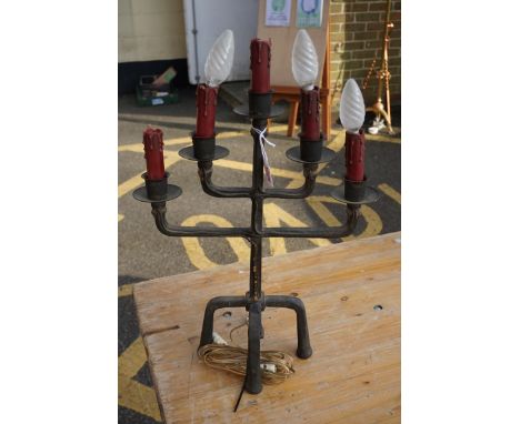 An old wrought iron five branch table lamp,&nbsp;46cm high.&nbsp; 