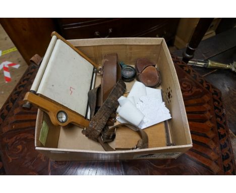 A small quantity of militaria and similar, to include: a World War I compass, in leather case.&nbsp; 