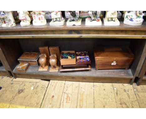 A Regency rosewood and brass inlaid sarcophagus tea caddy,&nbsp;29cm wide; together with a carved sandal wood casket; a silve