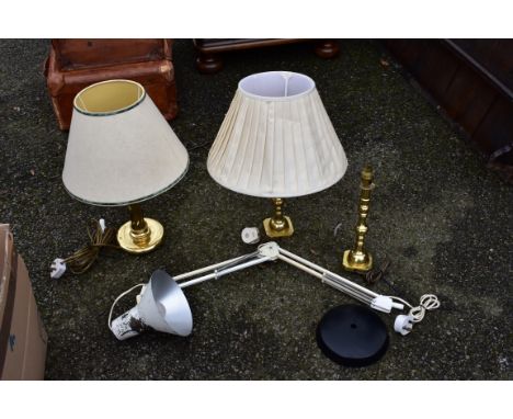 An anglepoise lamp; together with three brass lamps.Collection of this lot is strictly by appointment on Saturday 13th March 