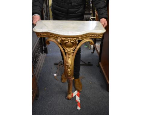 A 19th century giltwood and marble top console table,&nbsp;64cm wide, (chip to marble). 