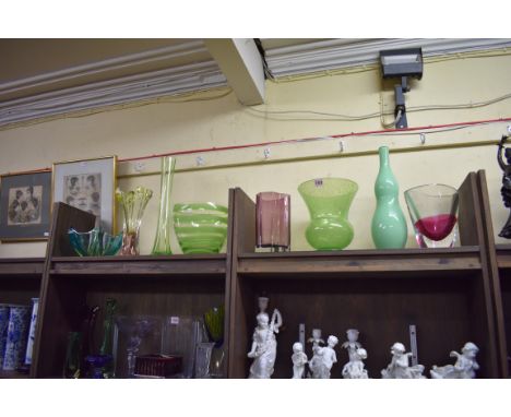 A small collection of coloured art glass vases,&nbsp;largest 41cm high. (8) 