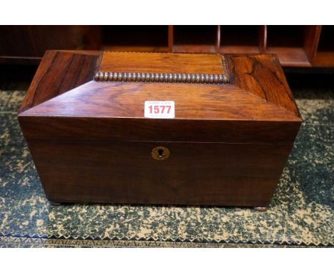 An early 19th century rosewood sarcophagus tea caddy,&nbsp;29.5cm wide.&nbsp; 