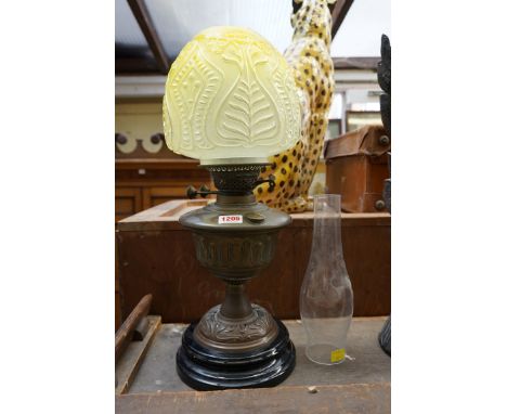 An Art Nouveau copper and brass oil lamp. 