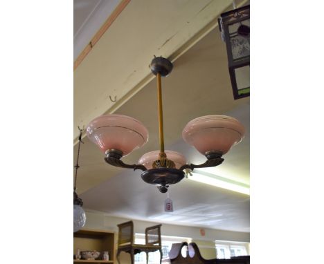 A vintage patinated metal three branch ceiling light,&nbsp;approx 53cm diameter.&nbsp; 