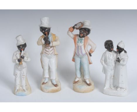A late 19th century German bisque porcelain figure, modelled as a negro musician, he stands finely dressed playing a horn, 23