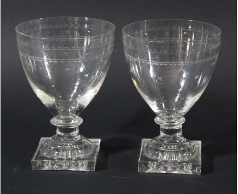 PAIR OF RUMMERS, circa 1800, the rounded bowls with polished oval and engraved star decoration on short knopped stems and lem