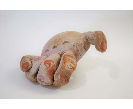 JILL CROWLEY (BORN 1946) a hand built stoneware sculpture of a hand, incised signature J Crowley. 7ins (18cms) high, 11 1/2in