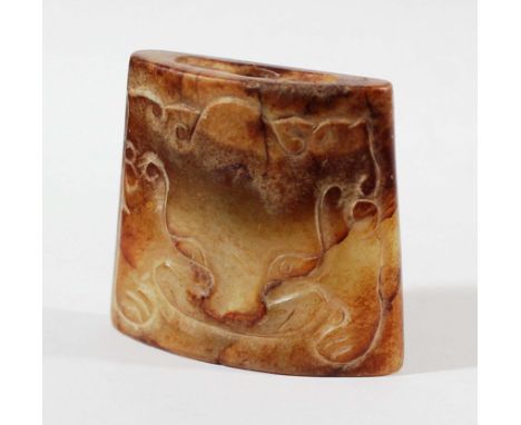 CHINESE GREEN AND RUSSET JADE PENDANT, perhaps Qianlong, of tapering, slender oval form, carved in low relief with a mythical