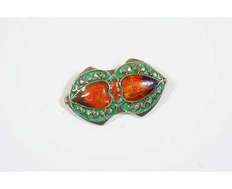 AN ENAMEL AND SILVER BROOCH BY MURRLE BENNETT &amp; CO. centred with two heart motifs decorated with orange and purple enamel