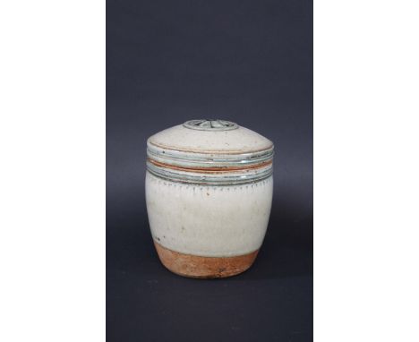 RICHARD BATTERHAM - LIDDED STORAGE JAR a stoneware lidded storage jar with a celadon glaze and incised decoration, the lid wi