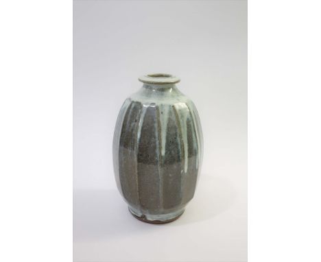 MIKE DODD (BORN 1943) - STUDIO POTTERY VASE a large stoneware vase with faceted sides and a wood ash glaze. Impressed seal ma