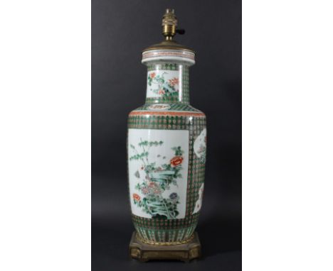 CHINESE FAMILLE VERTE VASE, 19th century, of baluster form, with panels of birds and insects amongst foliage on a trellis gro