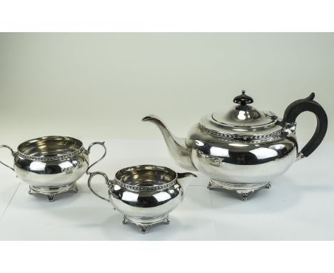 George V Heavy and Good Quality Silver 3 Piece Tea Service with Stylised Borders and Feet. Maker E. Viner. Hallmark Sheffield