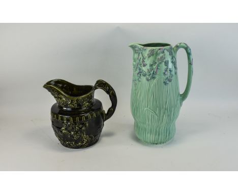 Large Carlton Ware Molded Jug, Foxglove pattern. Height 14 inches. Together with one other molded hunting jug.