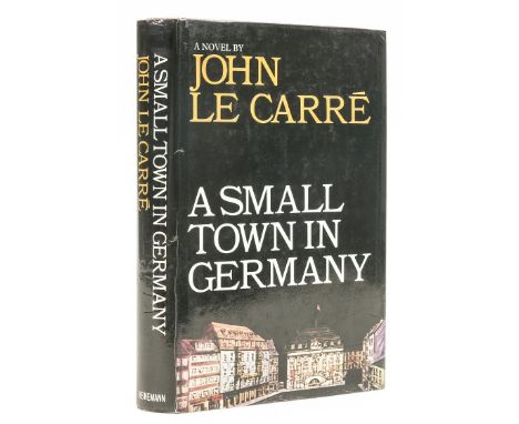 Le Carré (John) A Small Town in Germany, first edition, signed by the author on title, ink library stamps to front free endpa