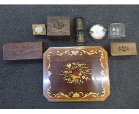 Eight musical boxes including wooden and one in the form of a miners lamp (8) 