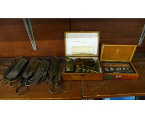 A cased set of weights with paper marked CCCP, other weights and scales including Salter’s 