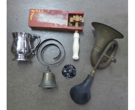 A servant's bell, pewter tankard, football rattle and a car horn 