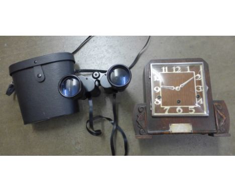 A pair of Mark Scheffel 20x50 binoculars and a mantel clock with presentation inscription 