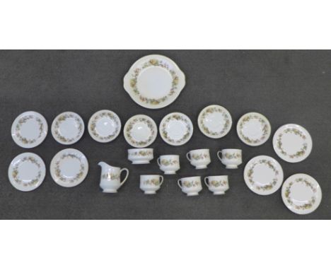 Six Royal Standard 'Lyndale' cups and saucers, a cream and sugar and a cake plate 