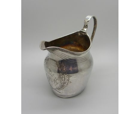 A George III silver jug, London 1800, 84g 