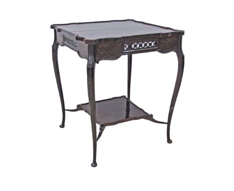 An Edwardian mahogany side table, the rectangular shaped top above a pierced frieze, raised on slender cabriole legs joined b