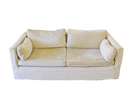 A modern two seater sofa upholstered in beige fabric, low back by Pambos Savvides. H75cm, W180cm, D85cm.