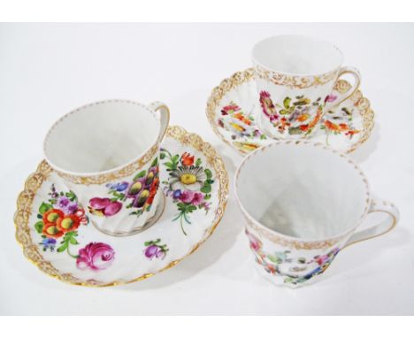 Three Dresden hand decorated porcelain coffee cups H60mm with two saucers, c19th century. (5)