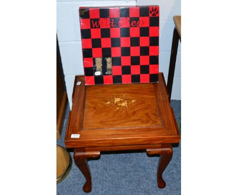 Wild Animals of Africa chess set, designed by Ben Homer and an inlaid hardwood combination backgammon/chess board table 