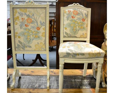 A white painted chair together with a similar fire screen each with matching upholstery