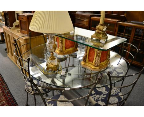 A modern painted and gilt twin pillar glass topped coffee table and a gilt metal mounted cut glass urn form table lamp and a 