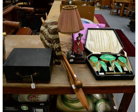 An Underwood typewriter; a Royal Doulton Priscilla figural table lamp; a Zulu shield; spear etc; and a set of Art Deco enamel