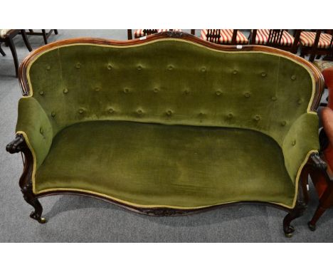 A Victorian carved rosewood button back sofa 