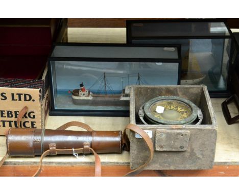 A Broadhurst telescope, G Gimble compass and two boats 
