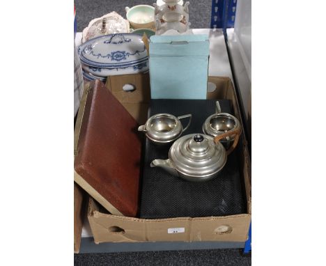 Two canteens of cutlery together with a three piece plated tea service and a contemporary boxed clock
