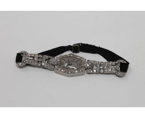 Superb quality Lady's platinum cocktail watch set with approximately 2.5ct diamonds CONDITION REPORT: The watch does not wind