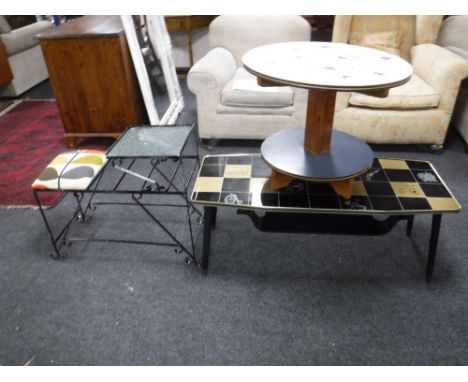 A mid 20th century circular Formica topped occasional table together with a 1970's coffee table with magazine shelf and a wro