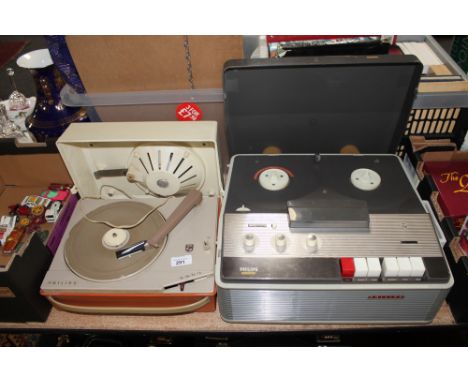 A Philips type EL-3548A/15 reel to reel tape recorder together with a Philips type AG4025/90 battery operated record player