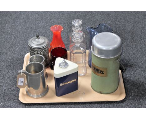 A tray containing tankards, vintage thermos flask, Schweppes table lighter, cranberry glass mug, two liqueur decanters etc