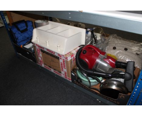 A painted kitchen shelf together with a boxed extraction hood and two boxes of cylinder vac, kitchen ware, telephones etc 