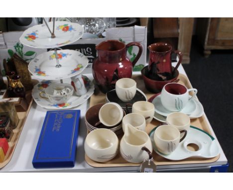 A tray containing three pieces of Torquay pottery, Carlton ware tea service and trio, three tier china cake stand together wi