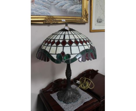 A Tiffany style table lamp with shade