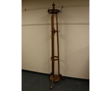 An Edwardian oak hat and coat stand