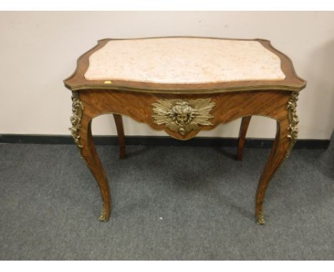 A French ormolu mounted and marble topped console table