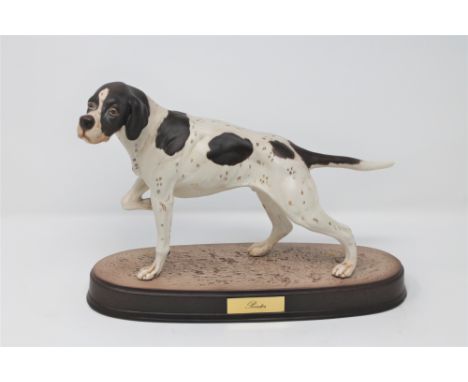 A Beswick figure of a pointer on stand