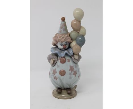 A Lladro figure - Clown with balloons  CONDITION REPORT: In good condition with no apparent faults. 